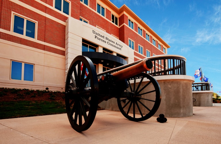 A replica 12-pound Napoleon cannon stands in silent watch outside the U.S. Army Forces Command and U.S. Army Reserve Command building on Monday, August 1, 2011 at Fort Bragg, N.C. The ceremony marks the completion of the Congressionally mandated 2005 Base Realignment and Closure action moving both FORSCOM and USARC headquarters from Fort McPherson in Atlanta, Ga.