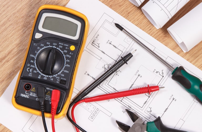 Electrical construction blueprint, drawings or diagrams, multimeter for measurement in electrical installation and accessories for use in engineer jobs